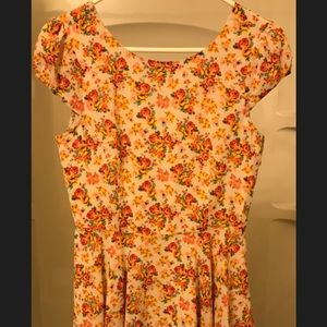 Multi-colored floral cap-sleeve, knee-length dress